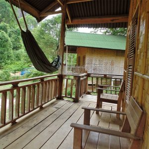 bungalow balcony with hammock and seats